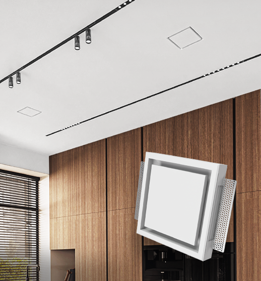 Minimalist square hidden air diffuser KVADRO integrated into a white ceiling of a modern kitchen with wood cabinetry