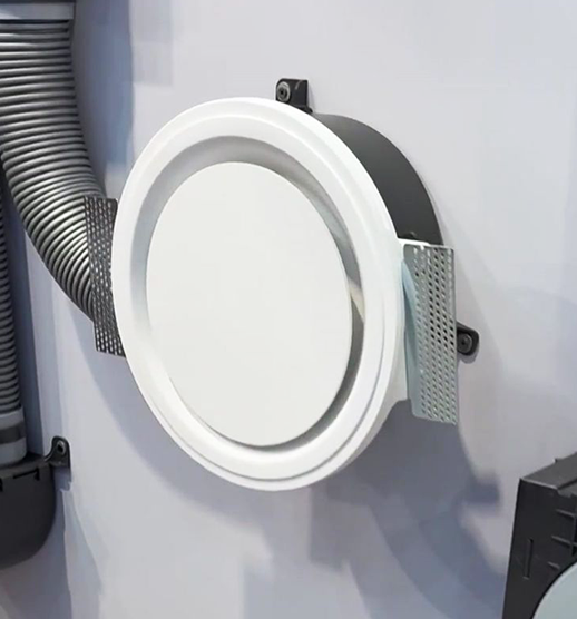 ERGOVENT RONDO COANDA ceiling diffuser connected to a ventilation duct